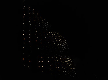 Abstract dark background with subtle financial graphs glowing softly.