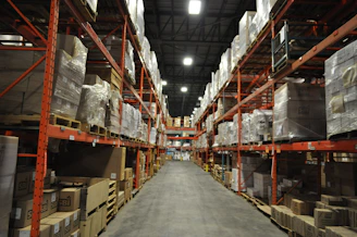 Modern storage warehouse with neatly organized boxes and climate control systems.