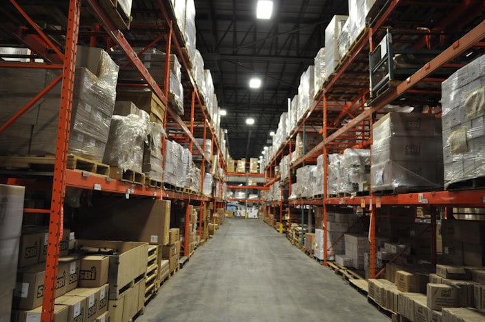 A professional team working in a logistics warehouse.
