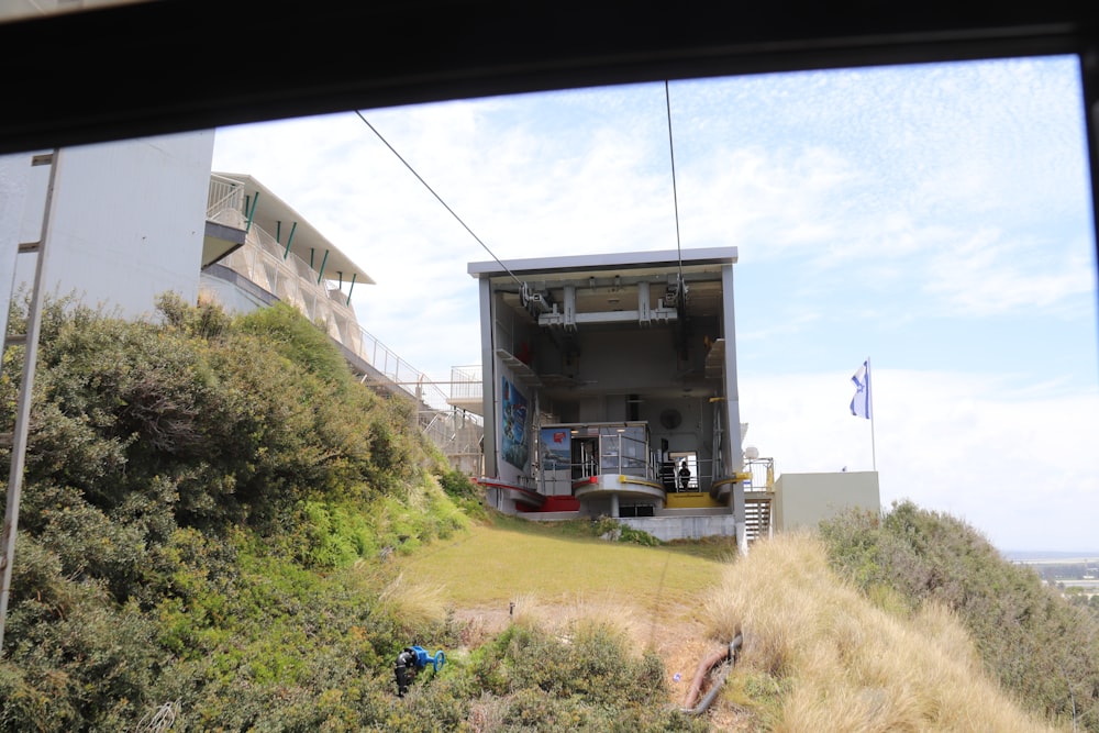 a view of a building from a train window