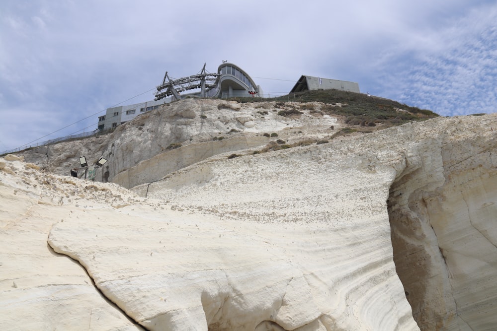 a hill with a building on top of it