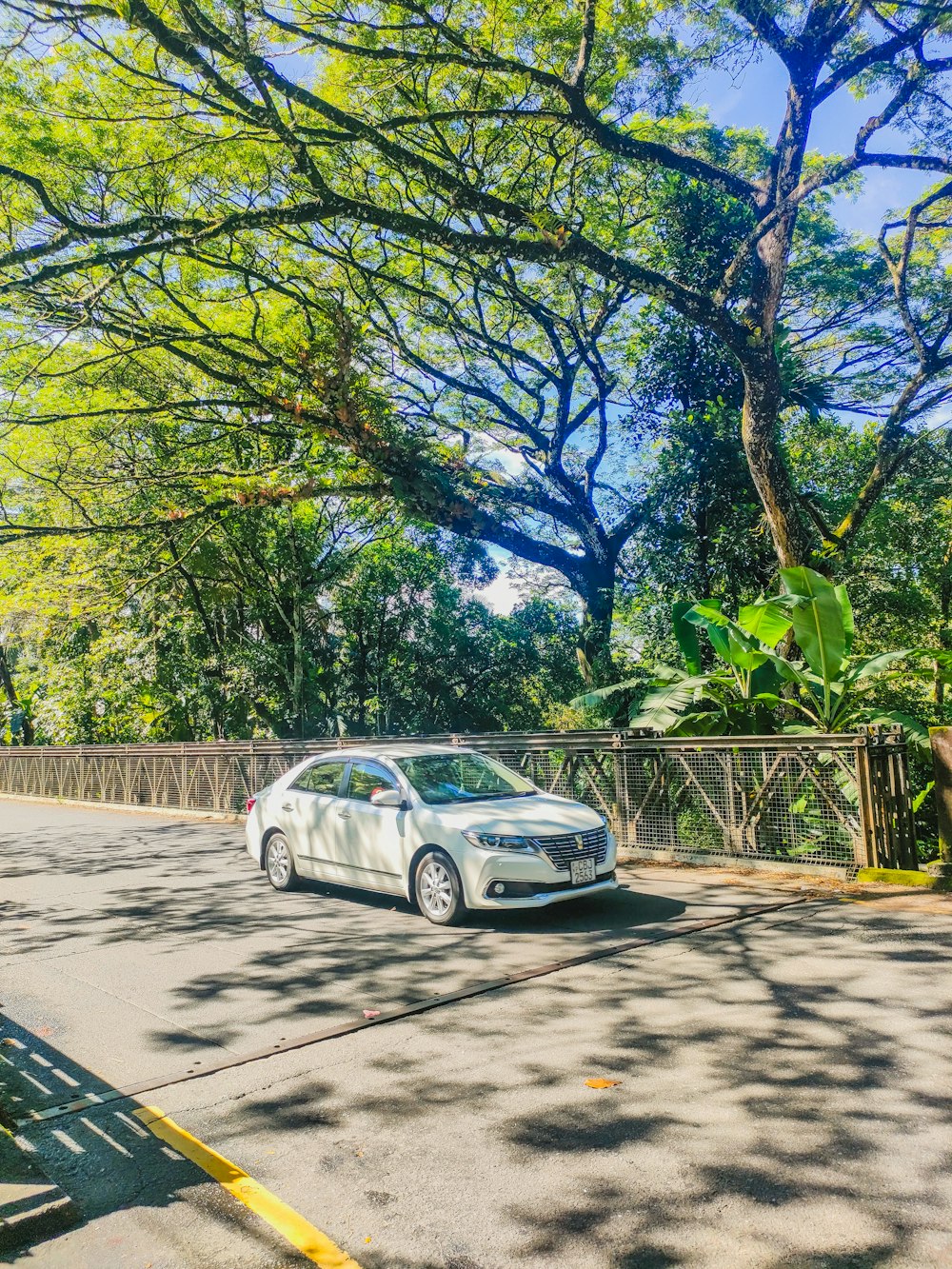 a car is parked on the side of the road