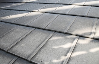 a close up of a roof that has been cleaned