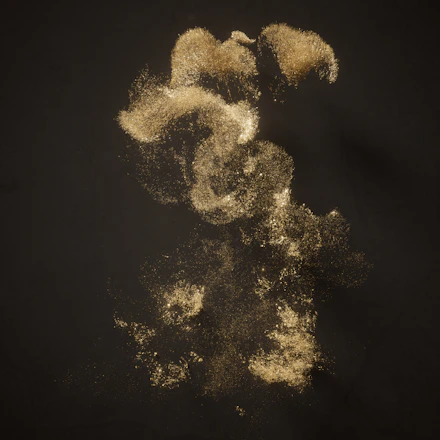 Glowing golden musical notes flowing over a deep black background, suggesting creativity and inspiration.