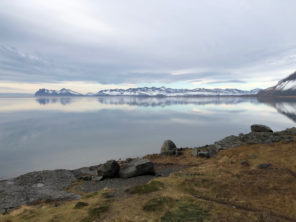 a large body of water surrounded by mountains