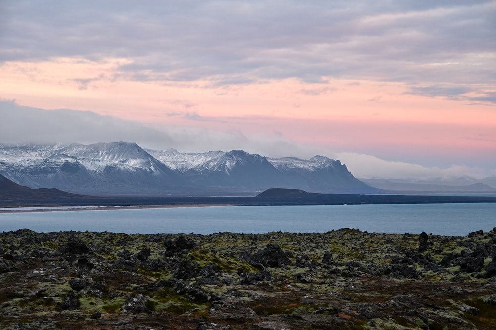 a large body of water surrounded by mountains