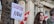 A young person with long hair stands in front of a building with Canadian flags. Next to them, a tree has a sign attached that reads 'Ceasefire Now!' in bold letters.