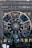 A large zodiac-themed structure is displayed on the facade of a building, featuring a prominent circular design with the twelve zodiac signs, a stylized sun with a face, and various large floral and cosmic elements around it. The scene is in a city setting with a specific brand name visible at the bottom.
