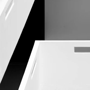 Minimalist black and white sketch of architectural forms with clean lines