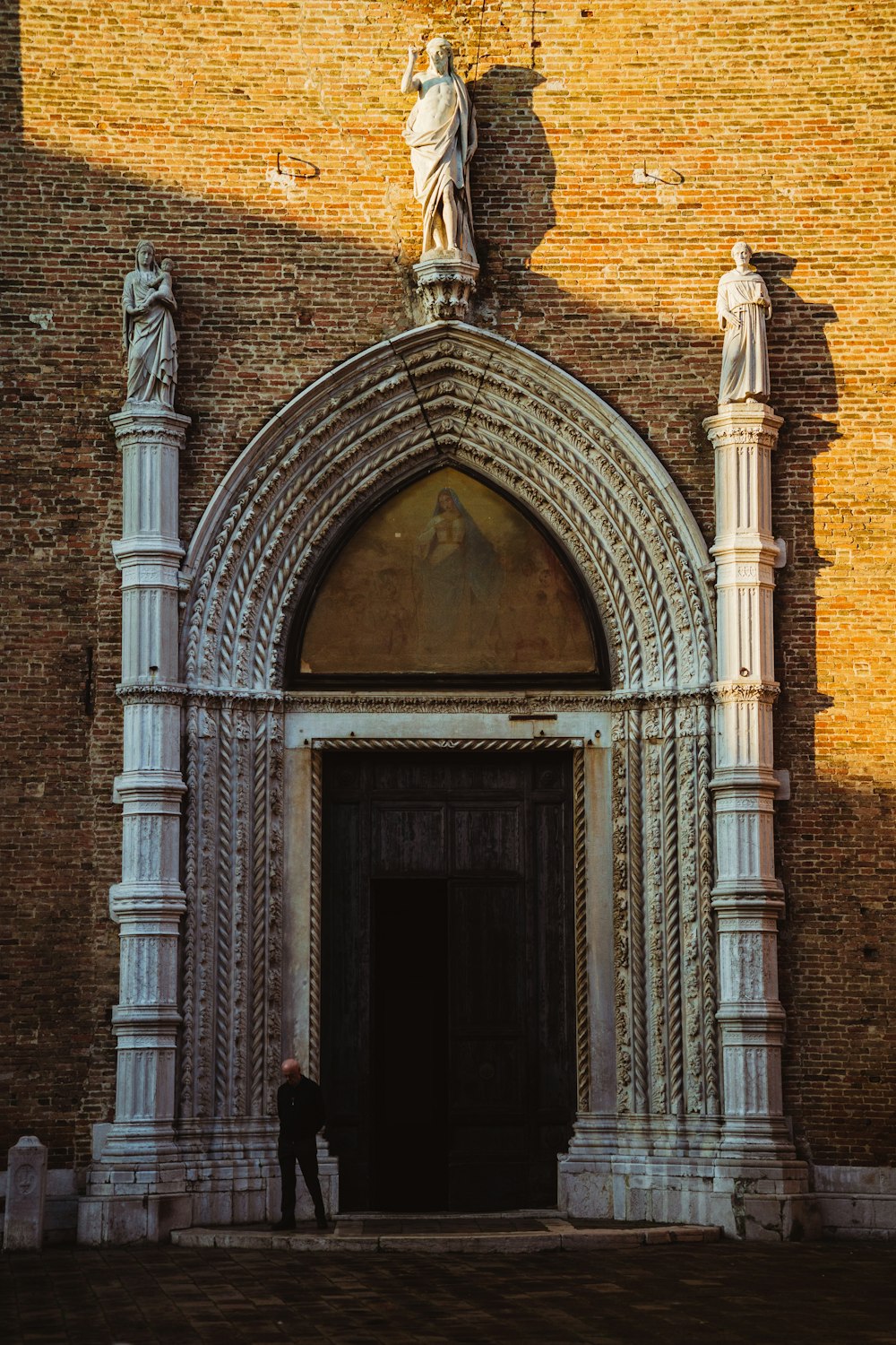a person standing in front of a doorway