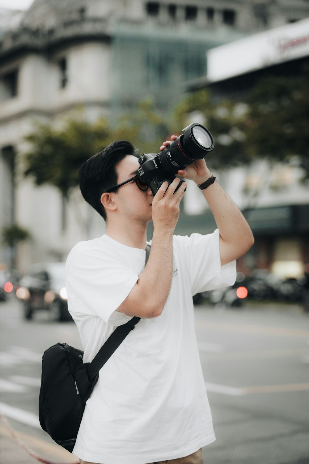 a man taking a picture with a camera