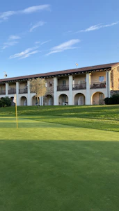 Modern condo with balcony and golf course view