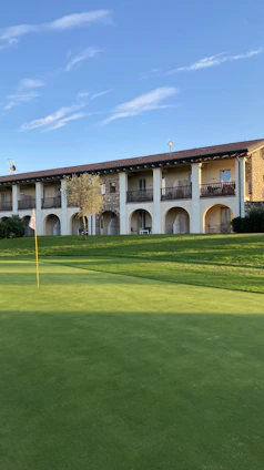 Modern condo with balcony and golf course view