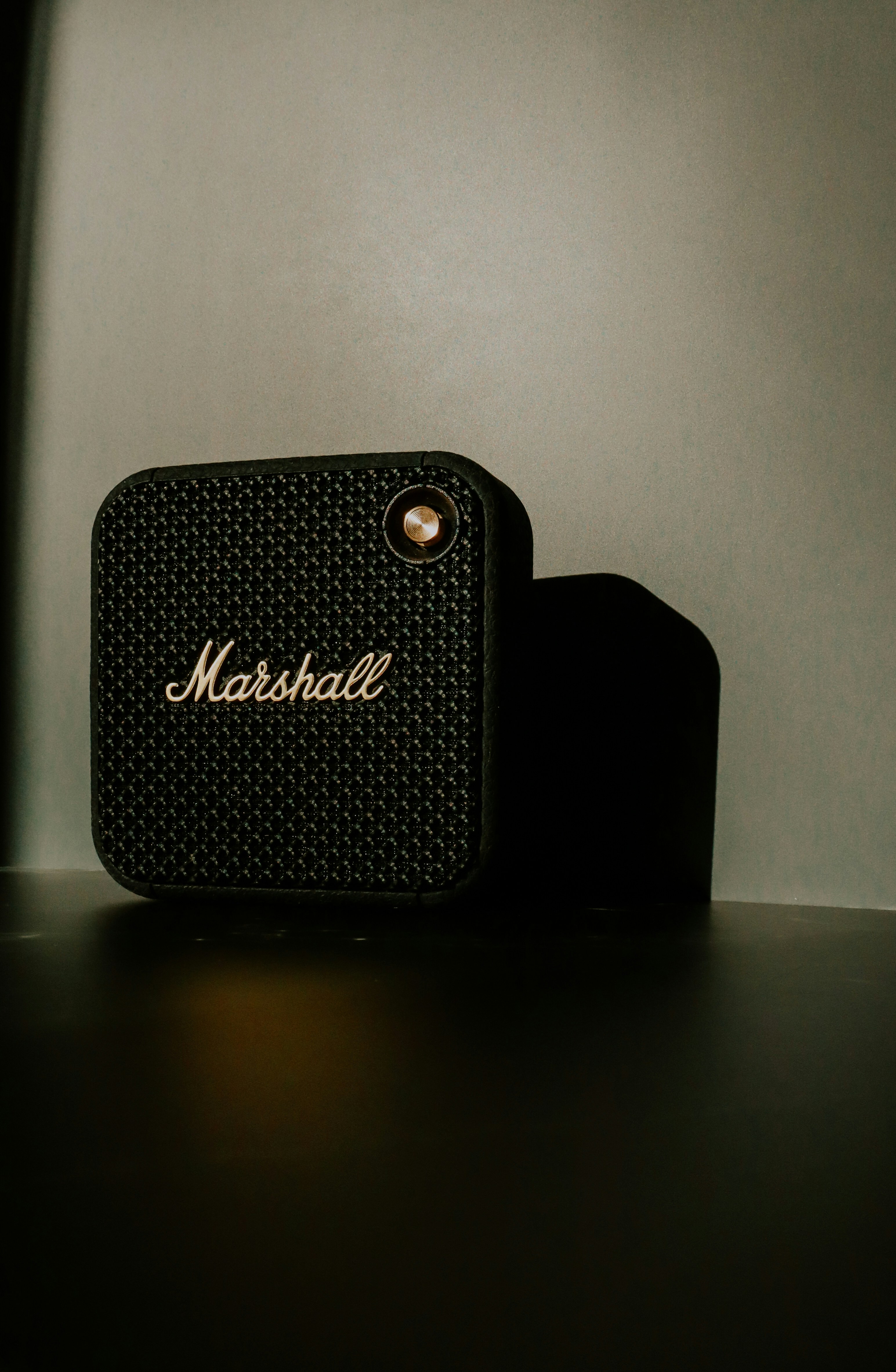 a close up of a speaker on a table