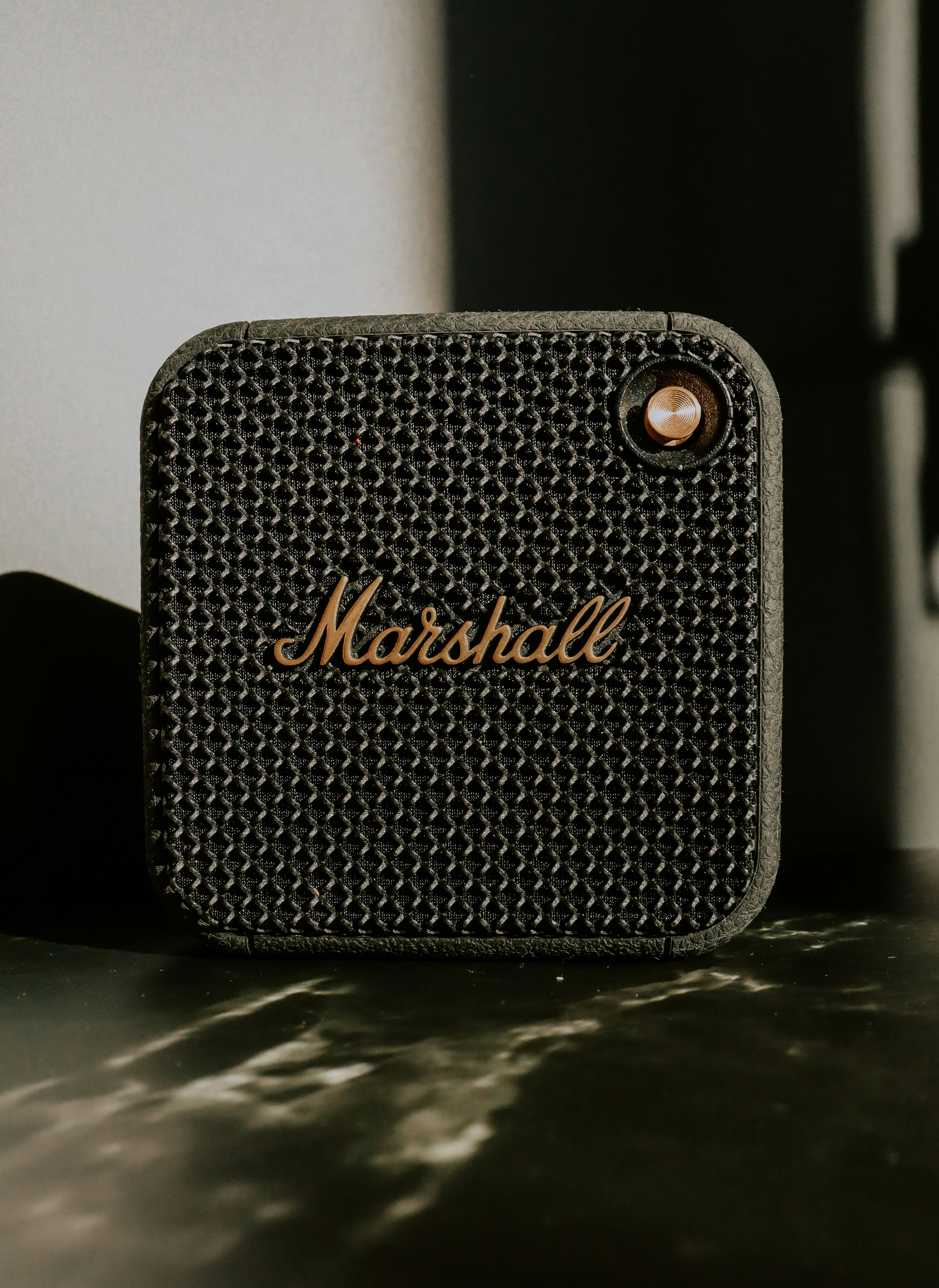 a close up of a speaker on a table