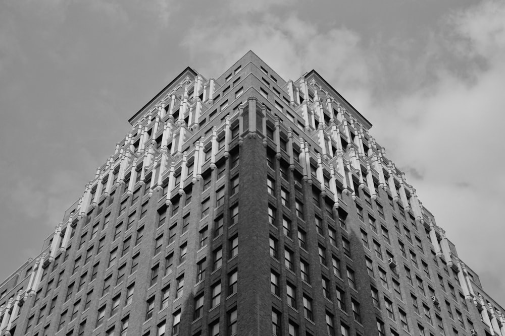 a black and white photo of a tall building