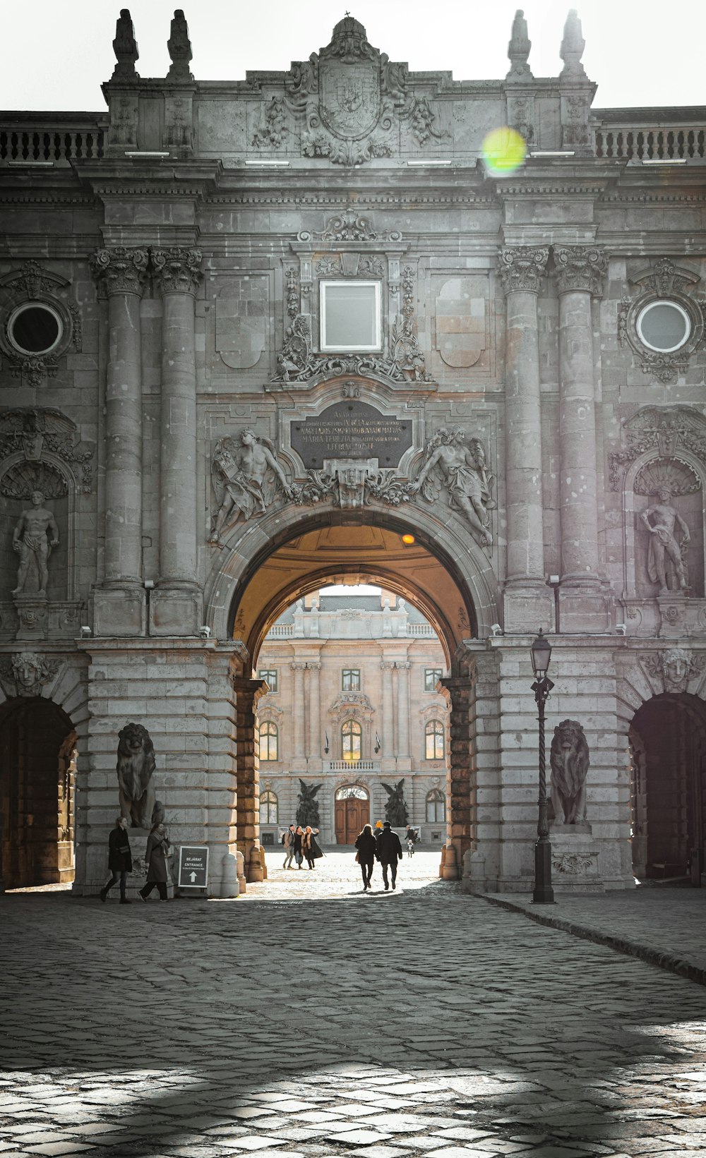 a large stone building with a large archway