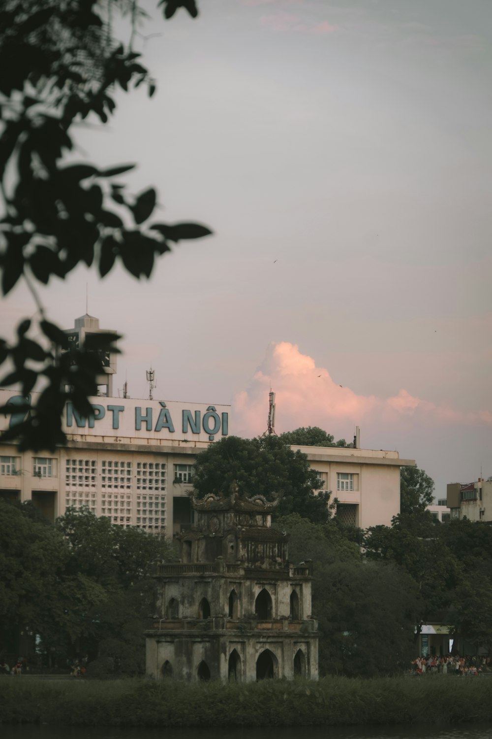 a large building with a sign on top of it