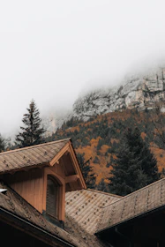 Cozy stone house in Fethiye nestled among pine trees with mountain views.
