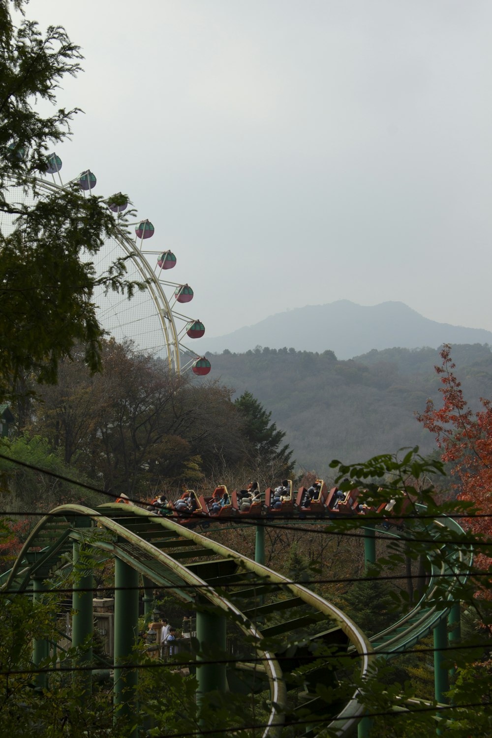 a roller coaster with people riding on it