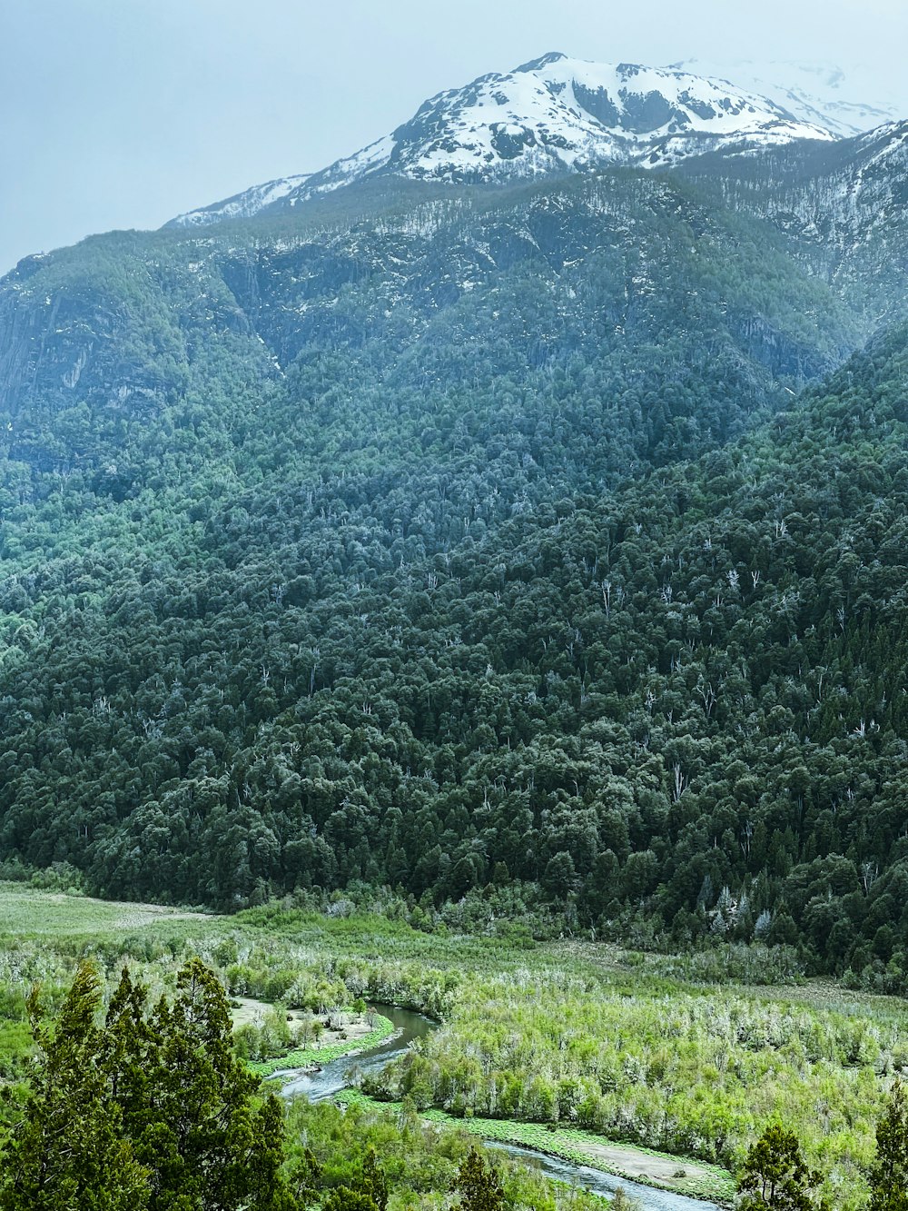 a mountain with a river running through it