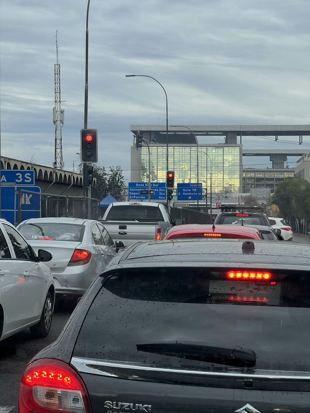 a bunch of cars that are sitting in the street