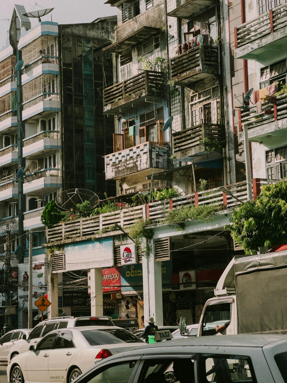 a city street filled with lots of tall buildings