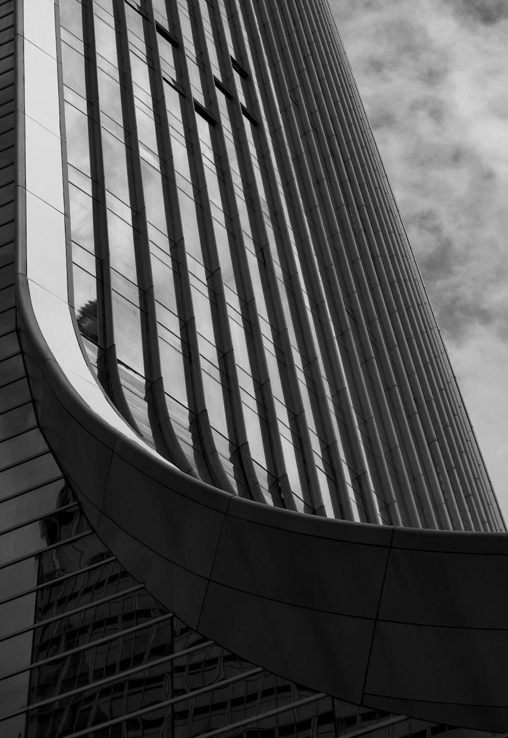 a black and white photo of a tall building