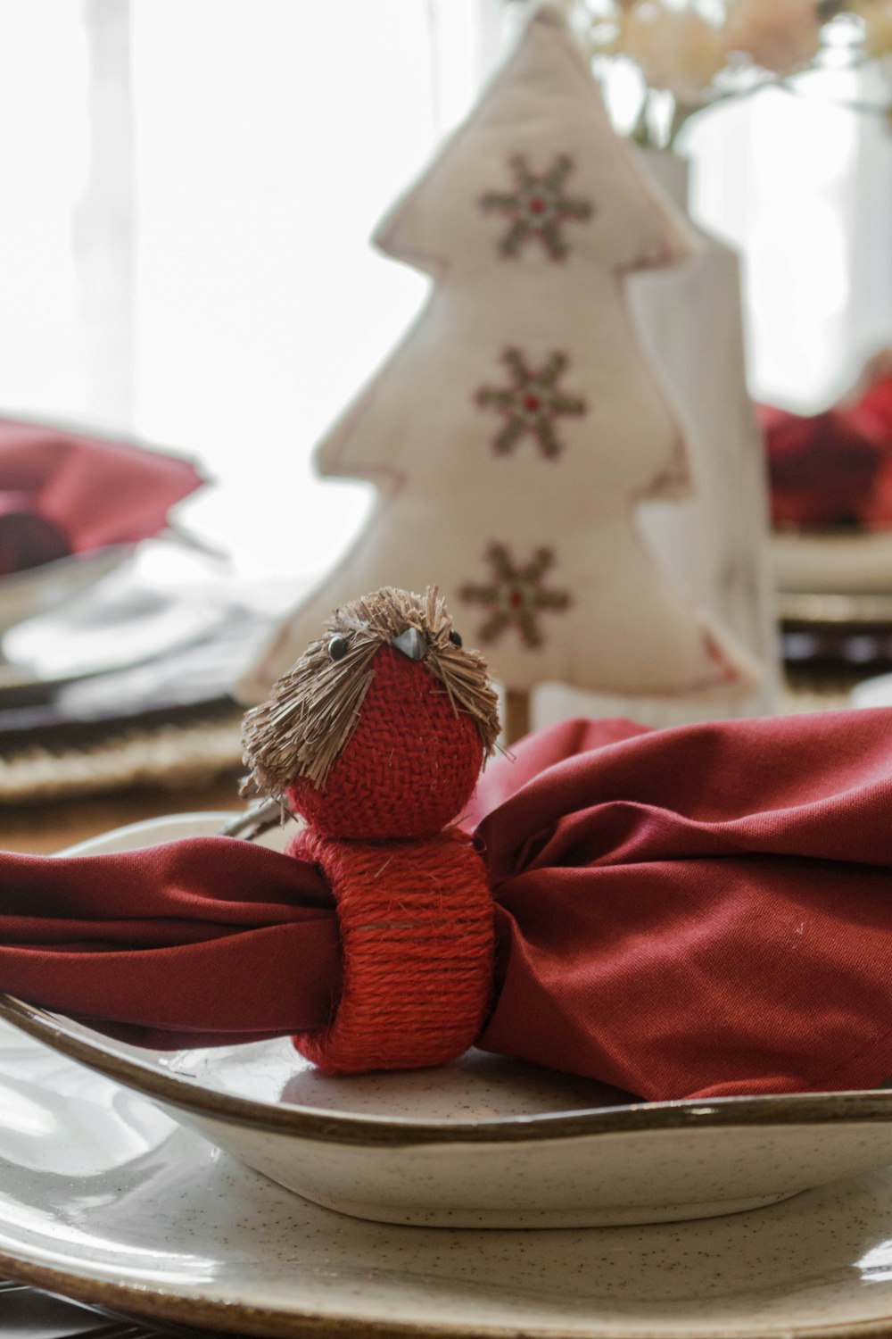 a plate with a red cloth on it