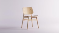 Modern pine wood chair with clean lines and soft cushions.