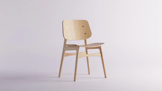 A handcrafted wooden chair made from Chilean natural wood, showcasing fine grain and smooth finish.
