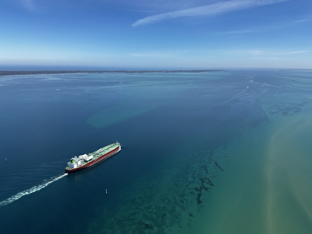 a large boat in the middle of a body of water