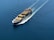 A cargo ship is sailing through a vast expanse of blue water, carrying numerous colorful shipping containers. The ship leaves a trail of waves behind, slicing smoothly through the calm sea.