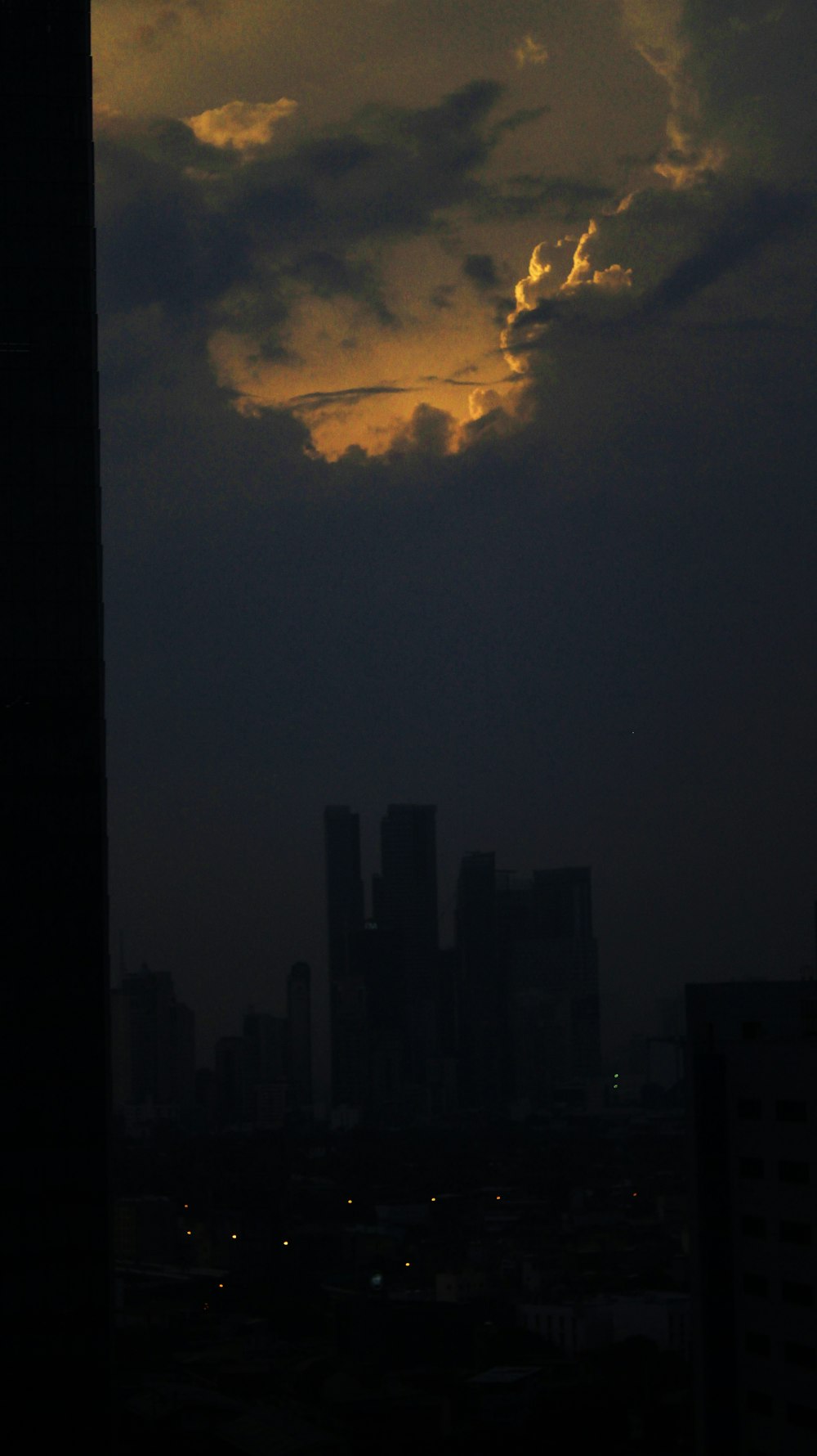 a view of a city at night from a tall building