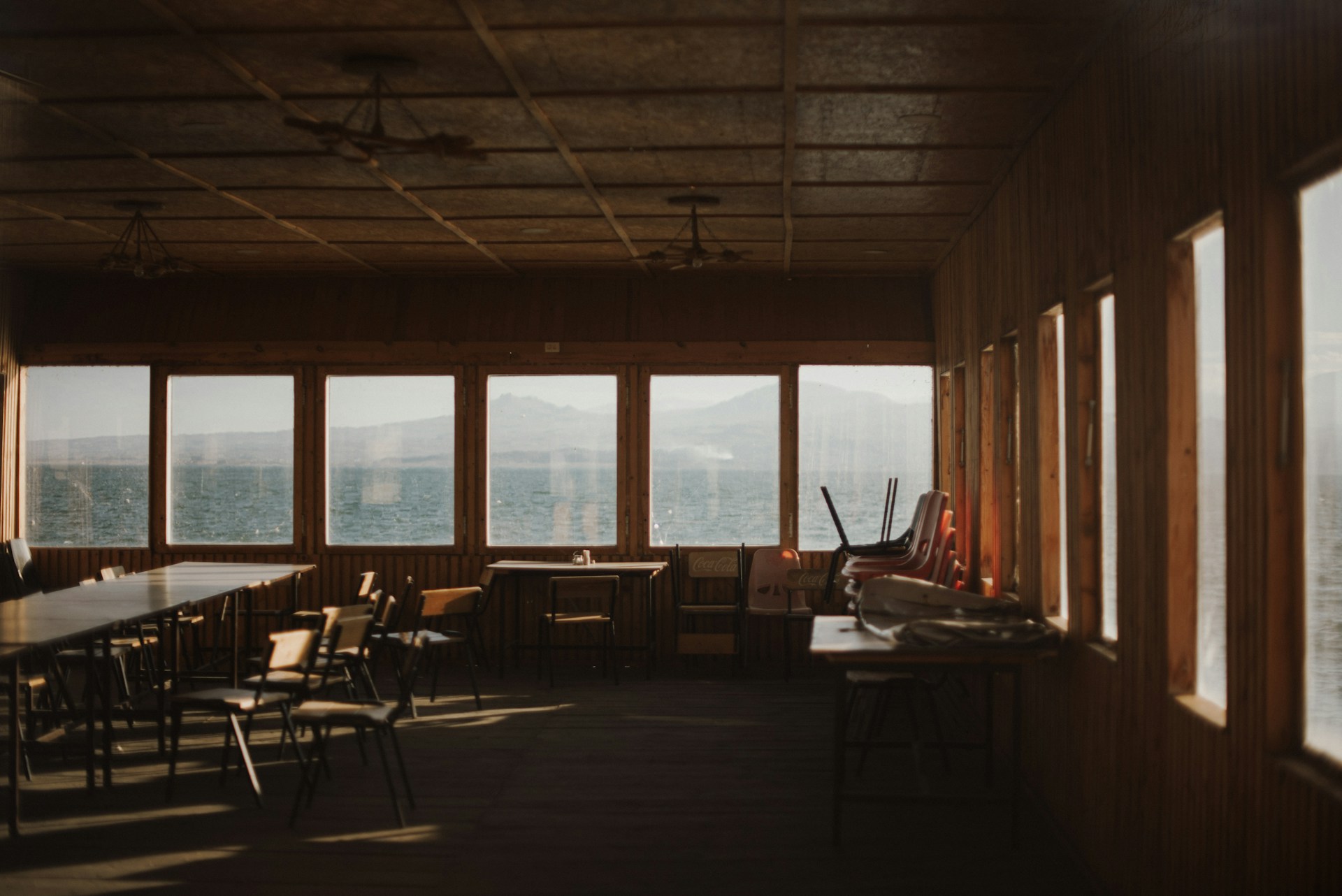 black and brown leather padded tub sofa