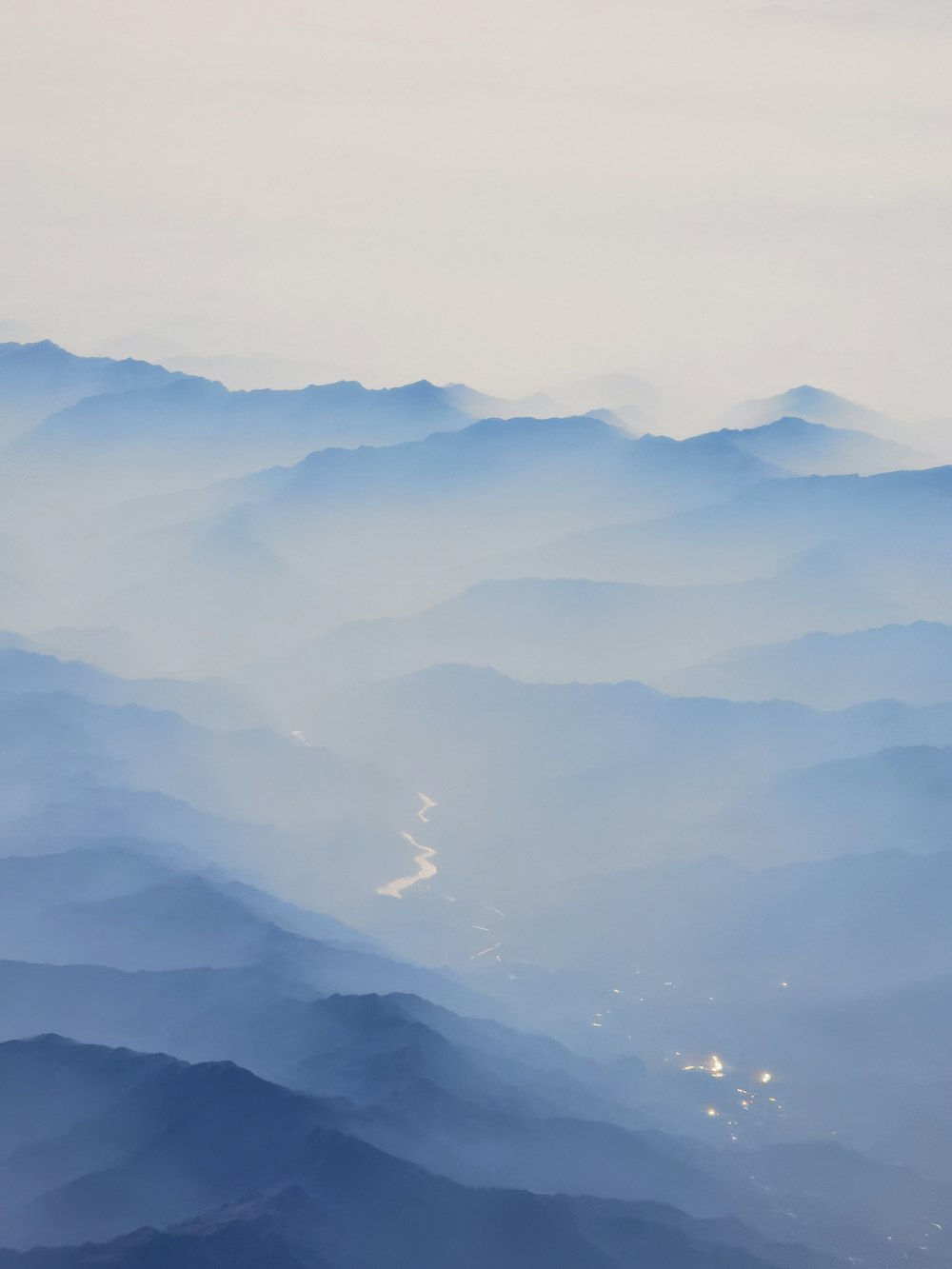 a view of a mountain range from an airplane