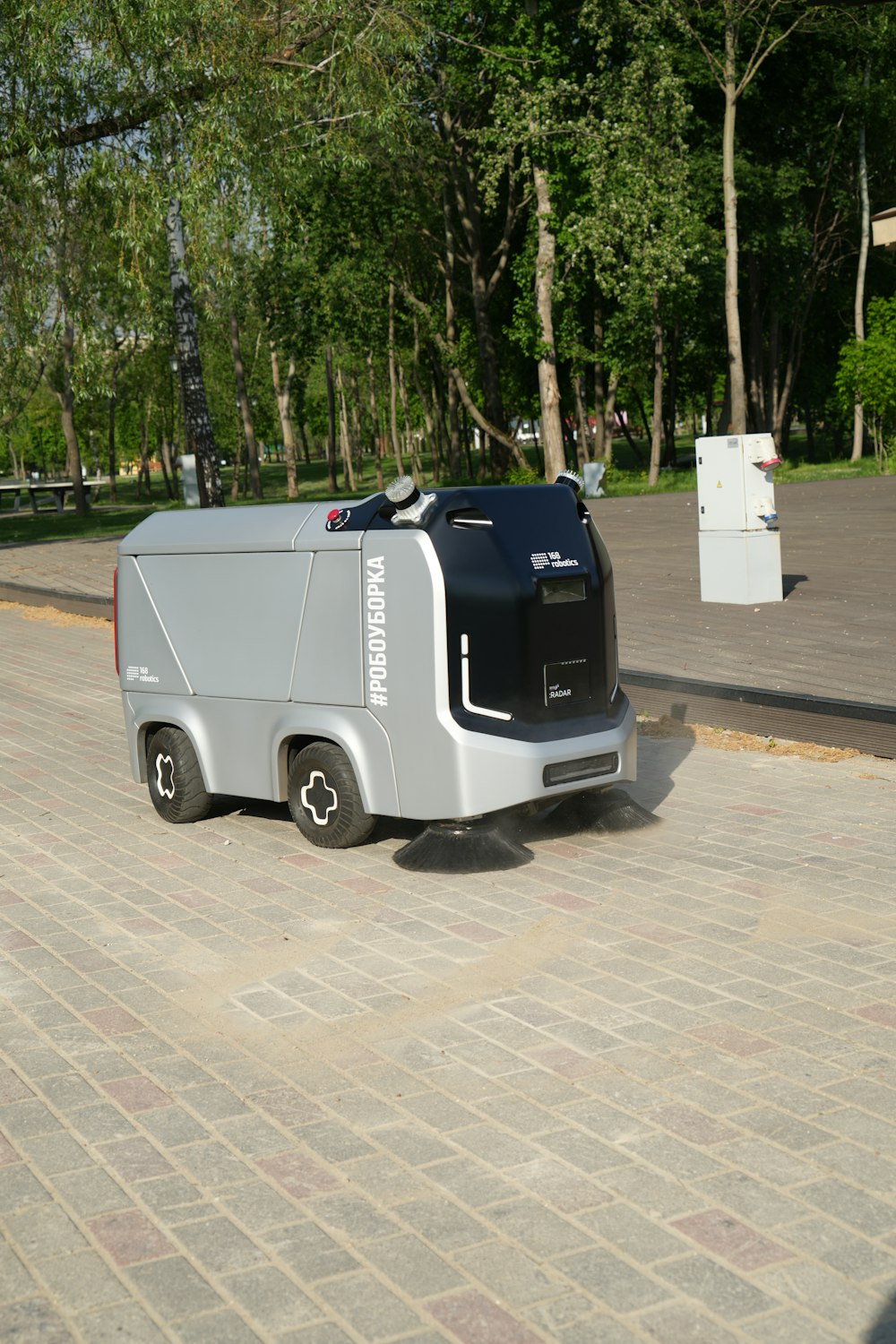 an electric vehicle parked on the side of the road