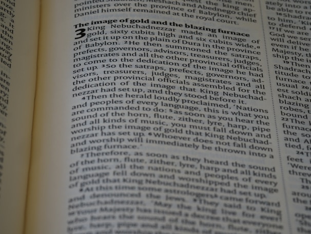 A modern depiction of scripture illuminated by light.