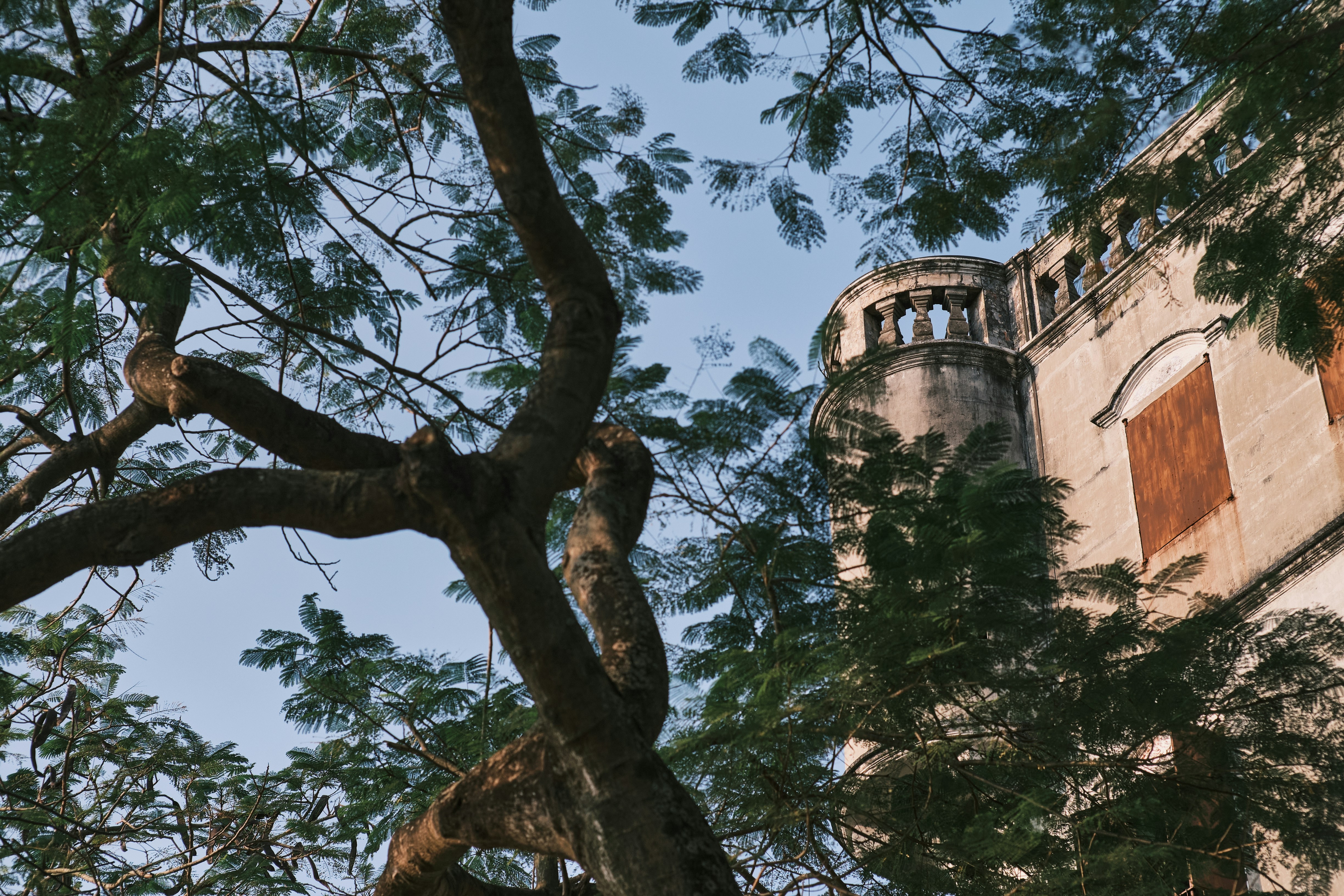a tall tower with a clock on the top of it