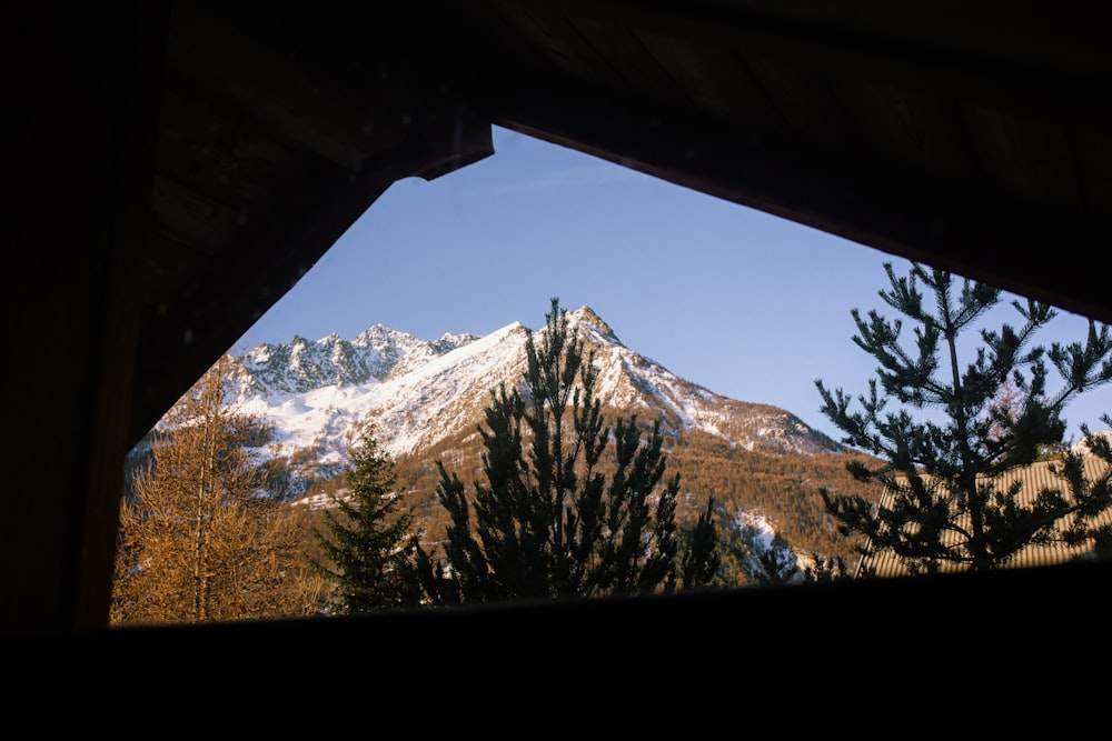 a view of a mountain through a window