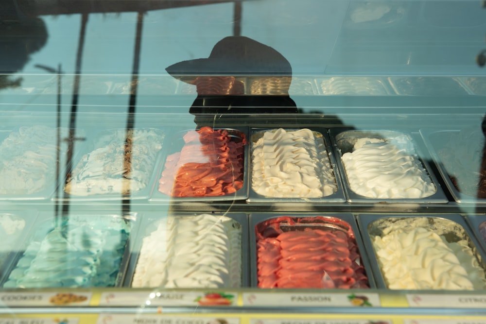 a display case filled with different types of ice cream