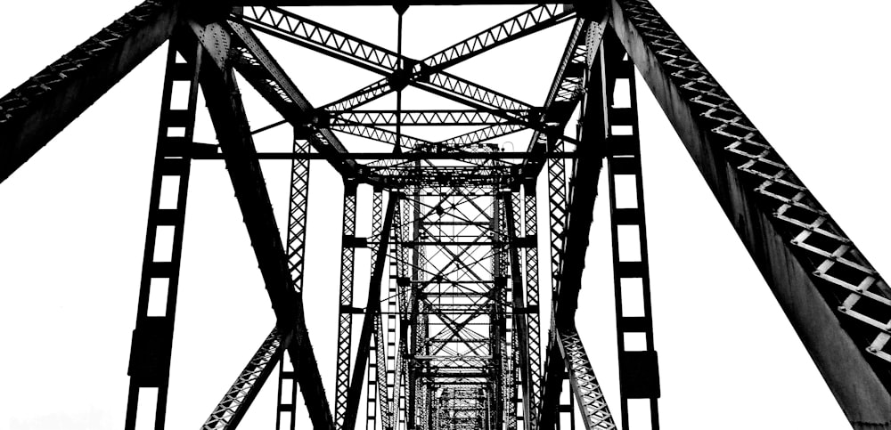 a black and white photo of a bridge