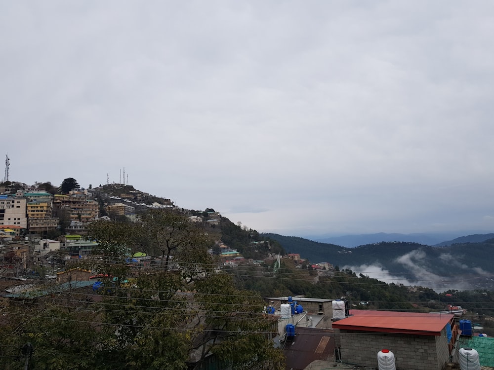 a view of a city with a mountain in the background