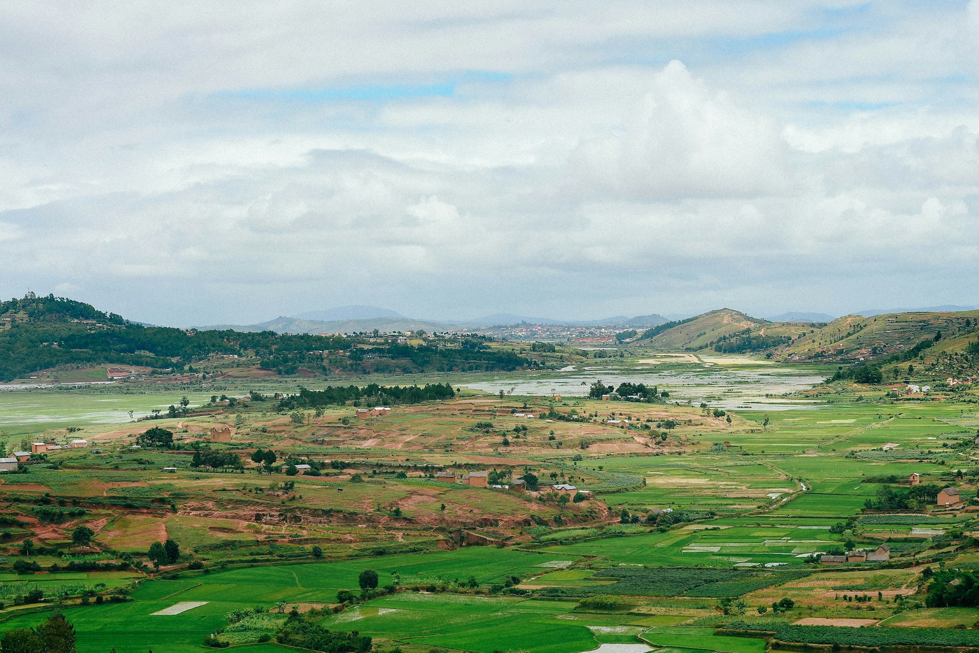 a view of a valley with a river running through it