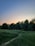 A serene landscape with a winding path leading into the horizon, symbolizing new beginnings.