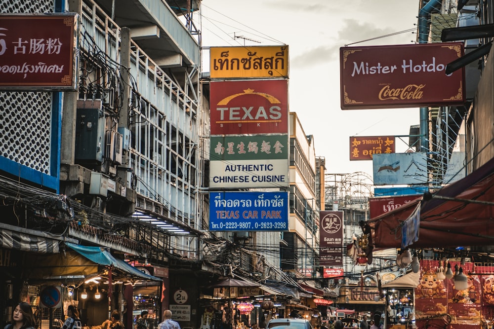 a city street filled with lots of signs