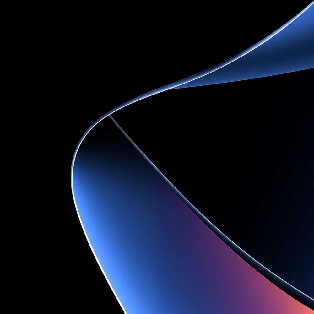 a black background with a blue and red curve