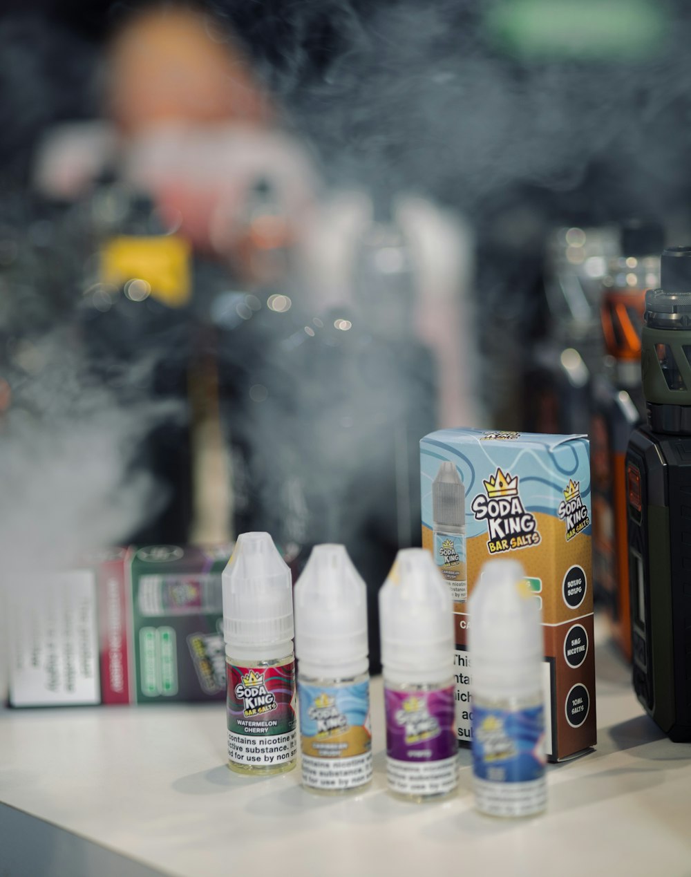 a group of vapors sitting on top of a counter