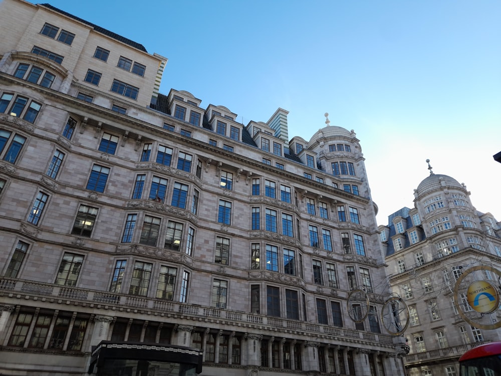 a large building with a clock on the front of it