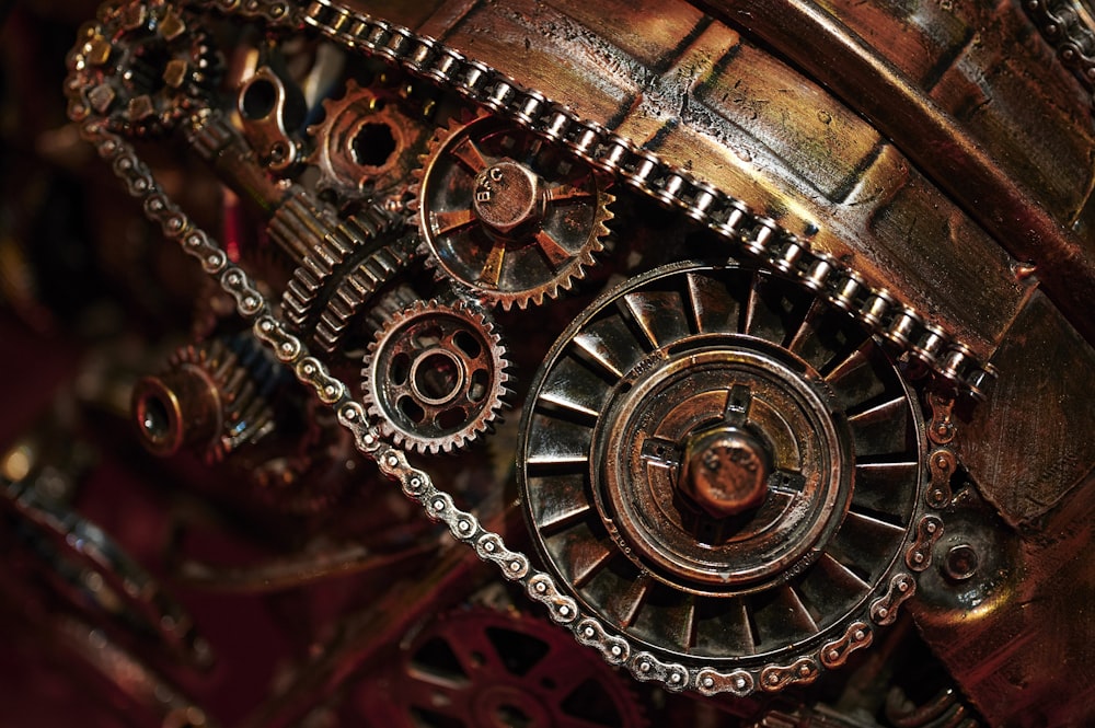 a close up of a clock with gears on it